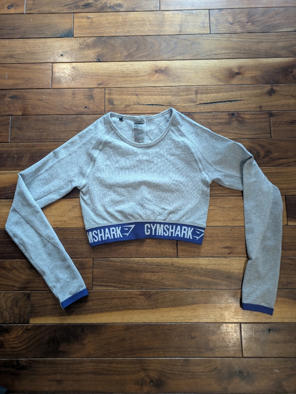 Gymshark Light Gray Long Sleeve Cropped Workout Top with Purple Logo Band